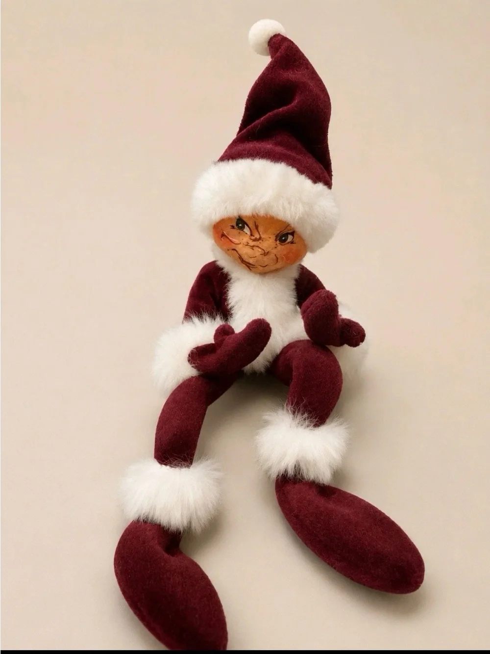 Annalee Maroon Burgundy Elf with White Faux Fur Trim and a Poseable Bendy Body.